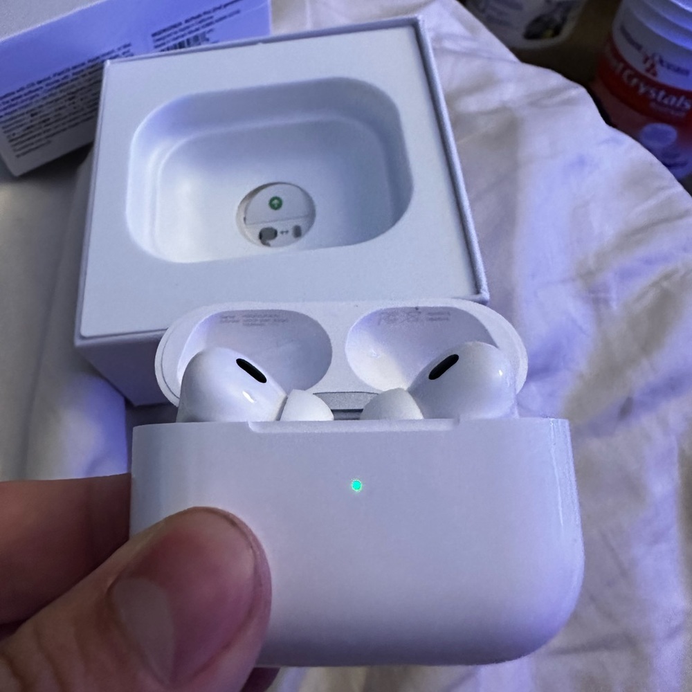 AirPods Pro generation 2 open box used once were just sealed w plastic unopened